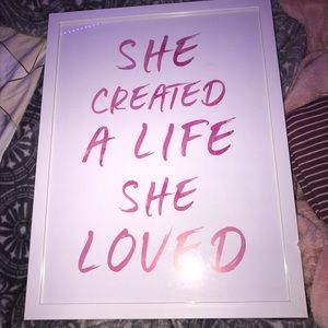 “she created a life she loved” wall decor